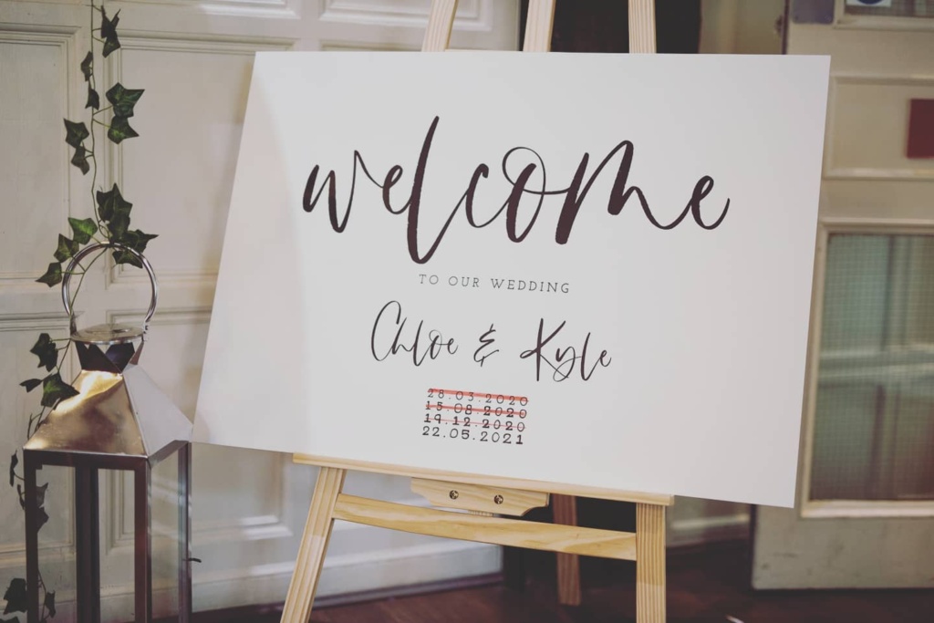 back in action wedding welcome board